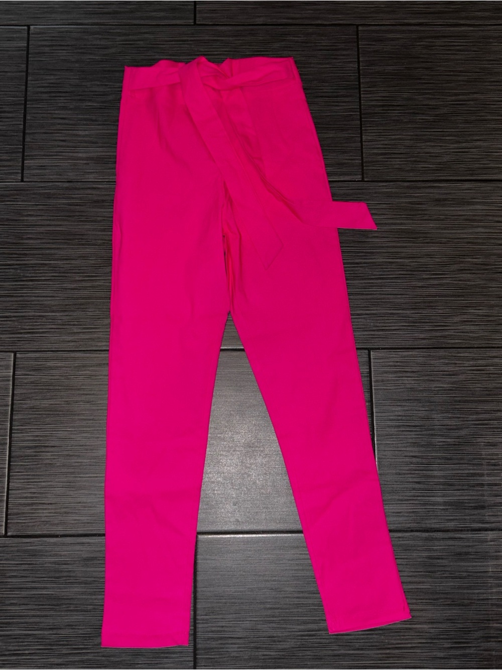 Hot pink high waisted pants with tie detail